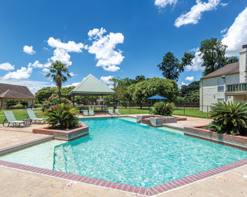 pecan grove apartments pool pool with shade at apartments in Alexandria